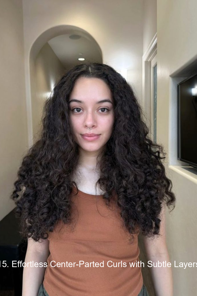 15. Effortless Center-Parted Curls with Subtle Layers