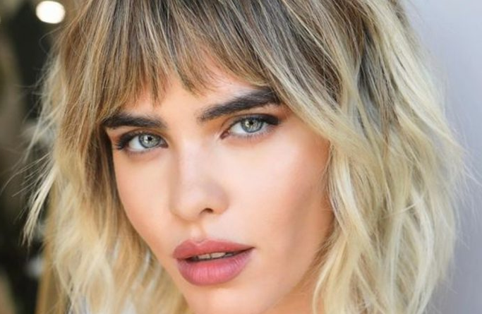 27. Blonde Shag with Textured Bangs