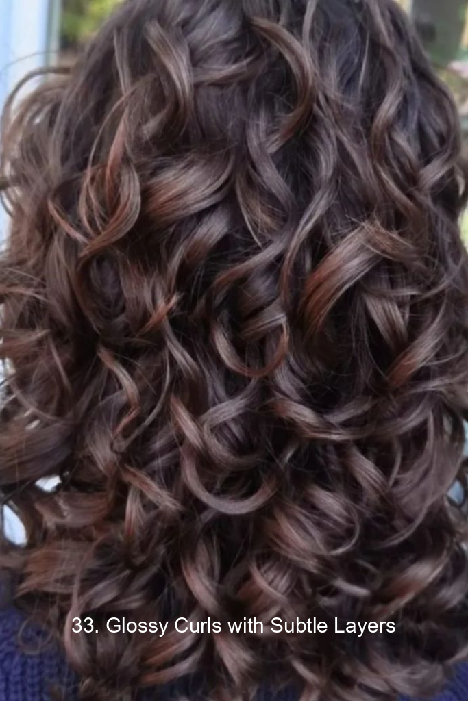 33. Glossy Curls with Subtle Layers