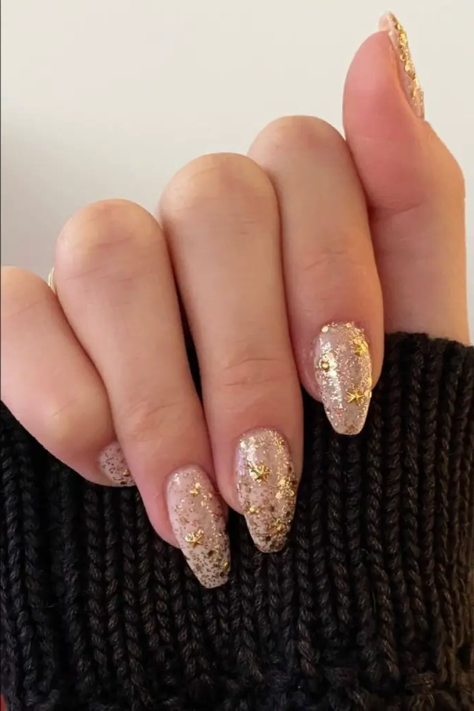 Golden Starscape Nail Design