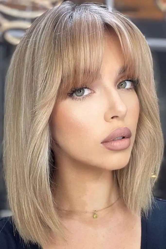 12. Lob with Curved, Brow-Grazing Fringe