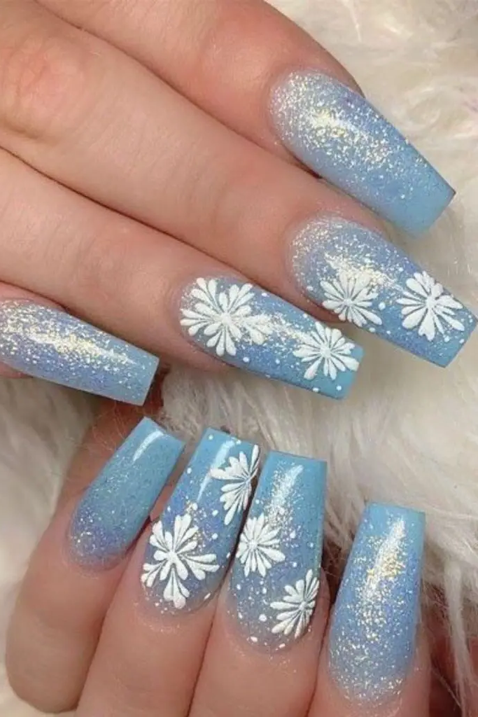14. Icy Blue with Fine Glitter Line Nail Design
