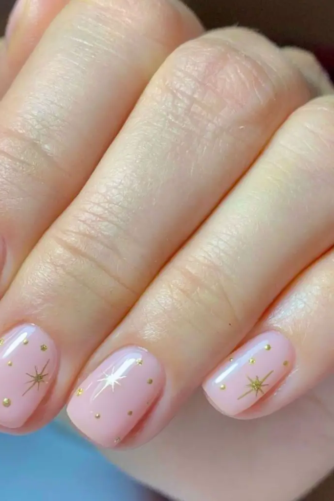 Soft Pink with Tiny Gold Dots Nail Design