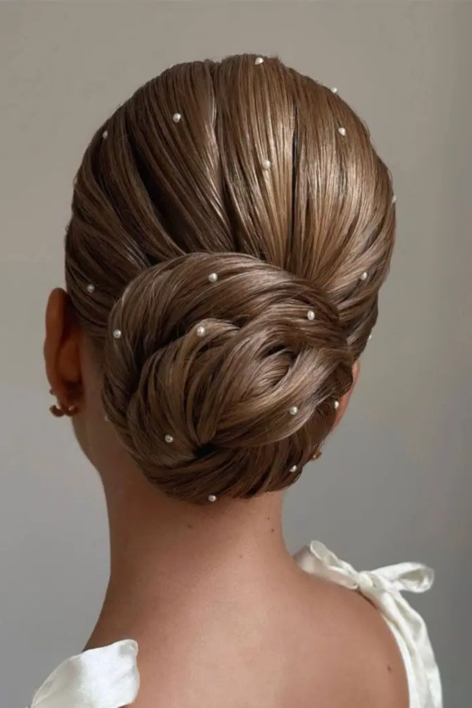 Sleek High Bun with Pearl Detailing