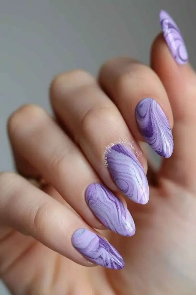 24. Cosmic Purple Swirl Nails