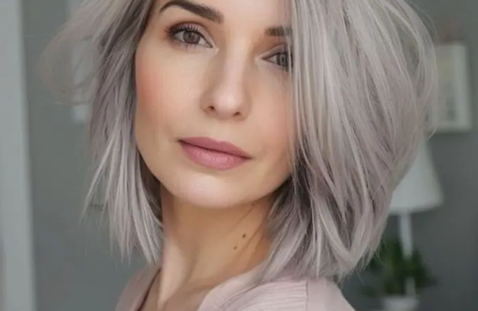 27. Icy Blonde Bob with Grey Tint