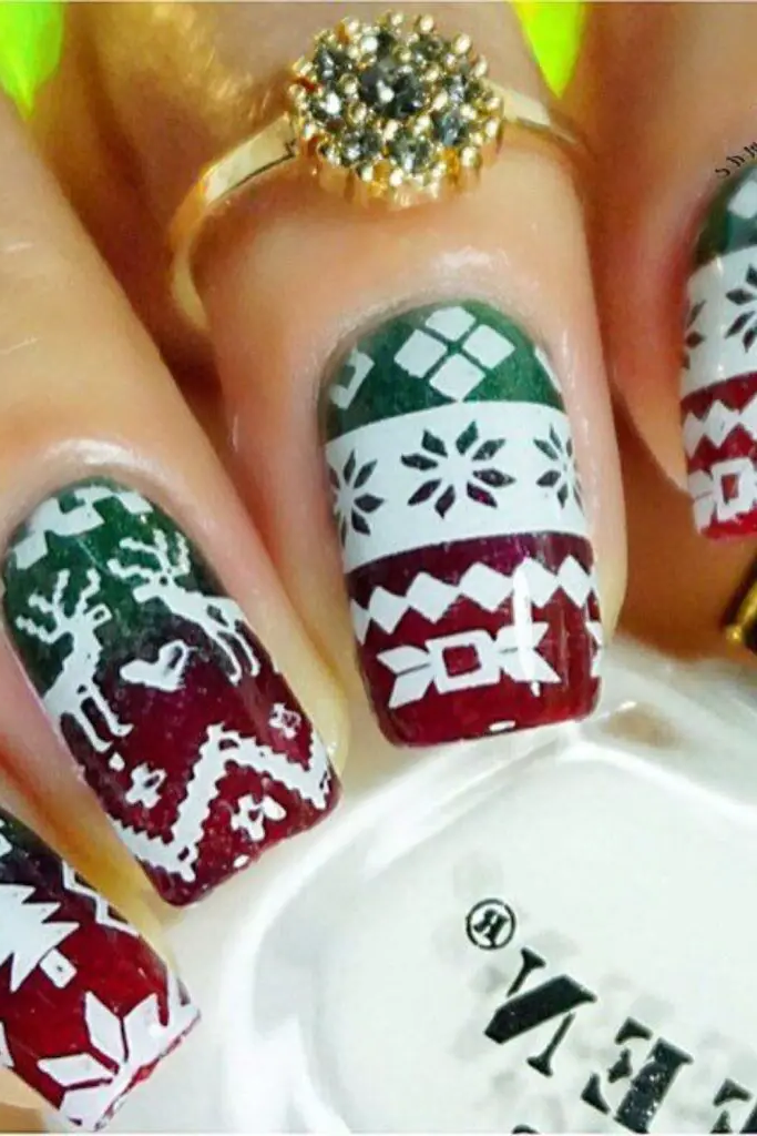 9. Festive Sweater Print Nail Design